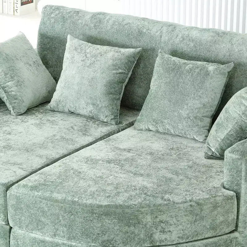 Divano chaise longue oversize con portabicchieri e cuscini