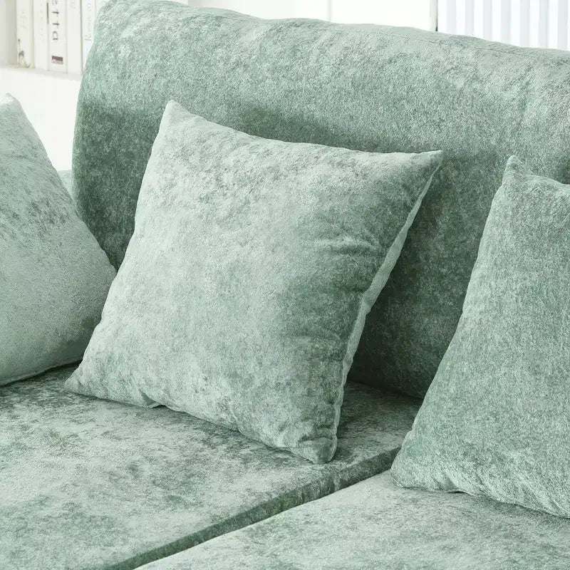 Divano chaise longue oversize con portabicchieri e cuscini